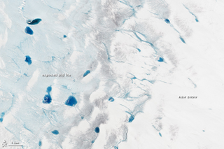 Illustration for article titled Melt Ponds on Ice Sheets Are Chillingly Beautiful